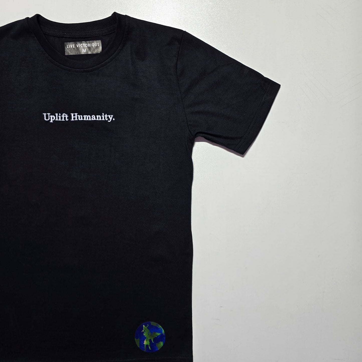 Uplift Humanity Tee