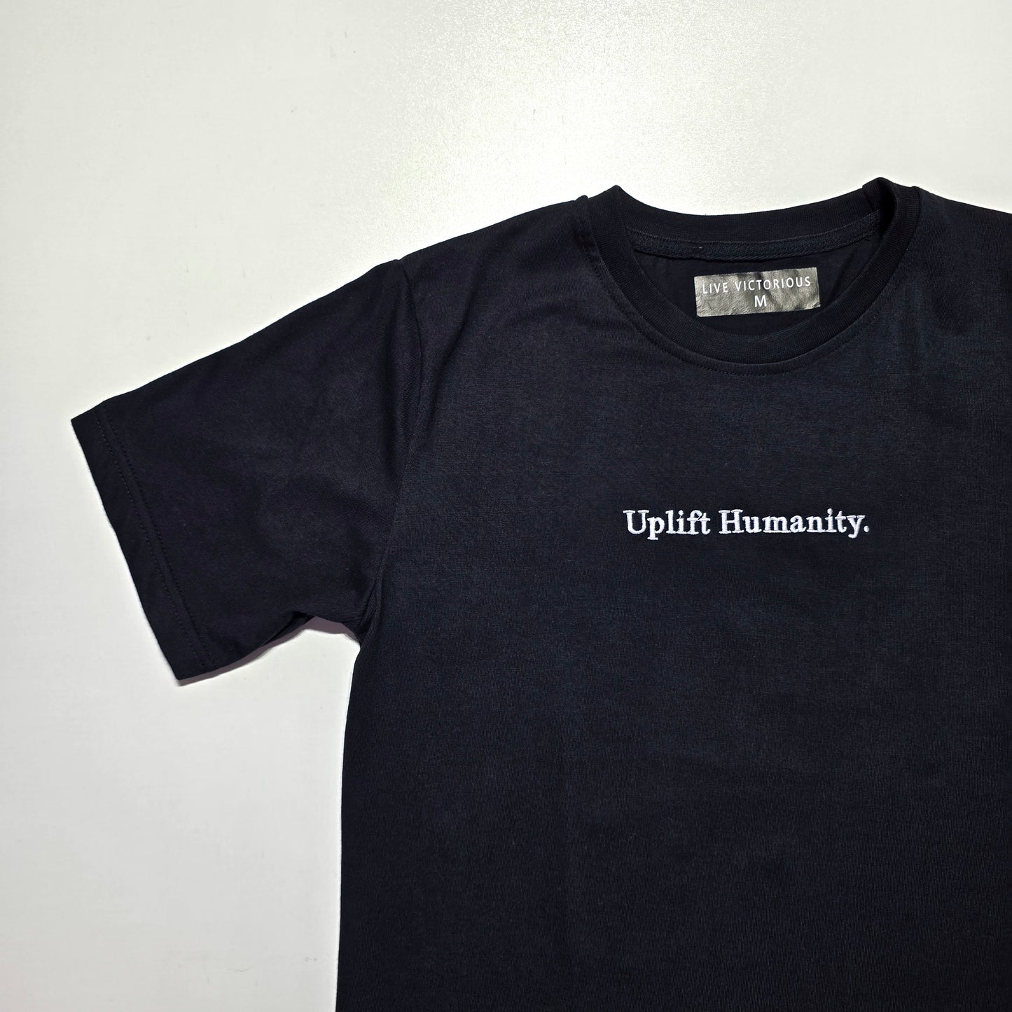 Uplift Humanity Tee